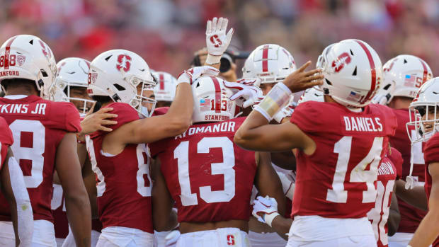 Sep 16, 2023; Stanford, California, USA; Stanford Cardinal wide receiver Elic Ayomanor (13) is congratulated by teammates after catching a touchdown pass during the second quarter against the Sacramento State Hornets at Stanford Stadium. Mandatory Credit: Sergio Estrada-USA TODAY Sports